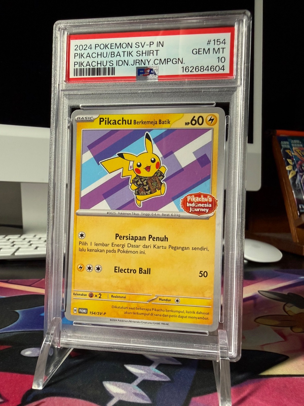 2024 Pokemon Indonesian SV-P Promo Pikachu in Batik Shirt Pikachu's Indonesia Journey Campaign 154