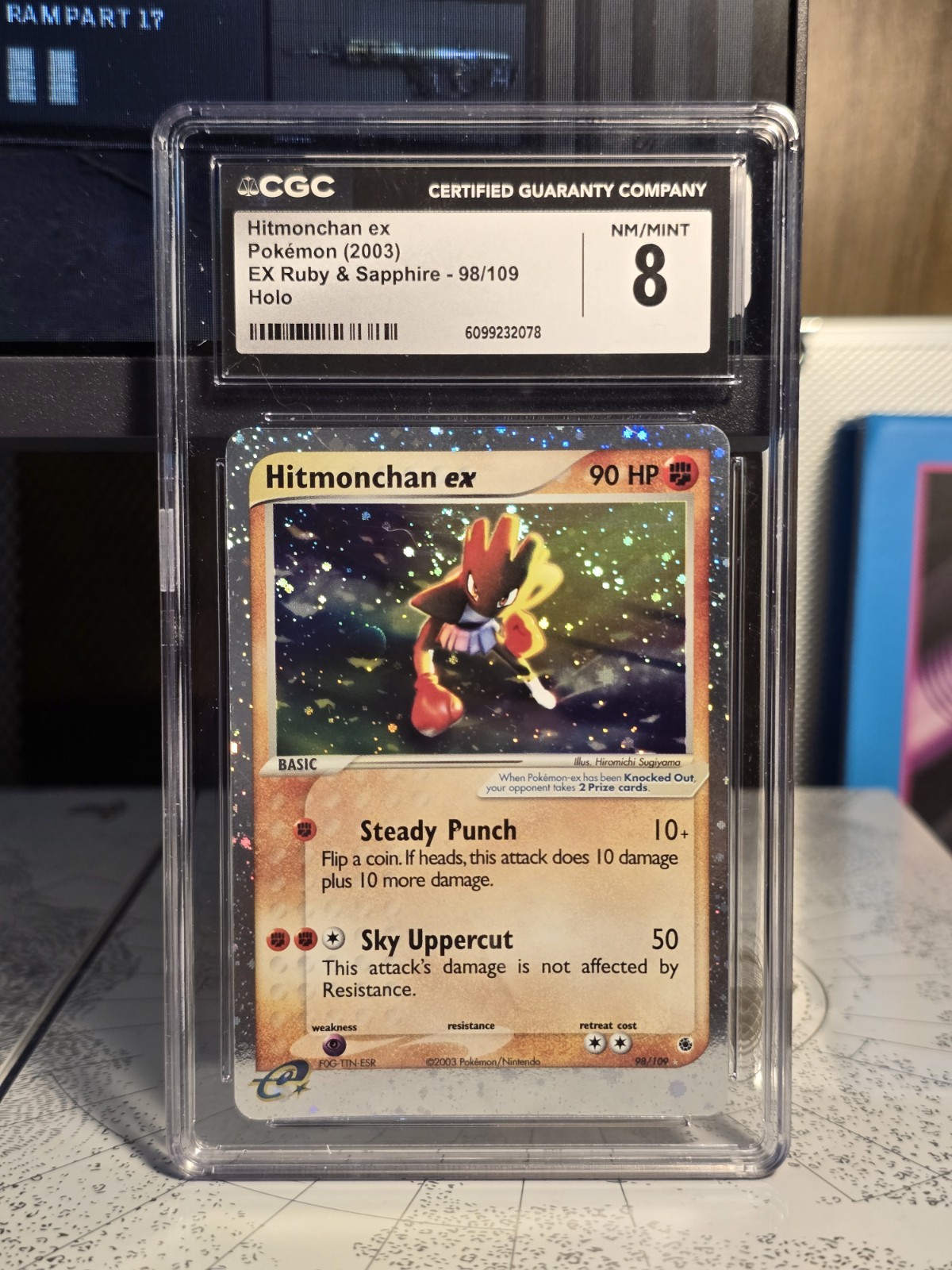 2003 EX Ruby & Sapphire (2003 Copyright, w/ "e" Symbol) - English Hitmonchan ex Ultra Rare Holo 98/109