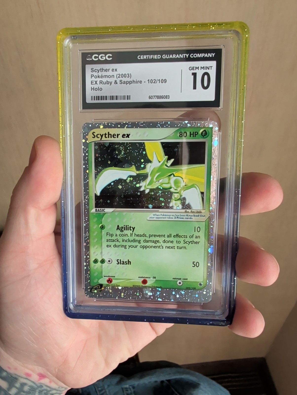 2003 EX Ruby & Sapphire (2003 Copyright, w/ "e" Symbol) - English Scyther ex Ultra Rare Holo 102/109