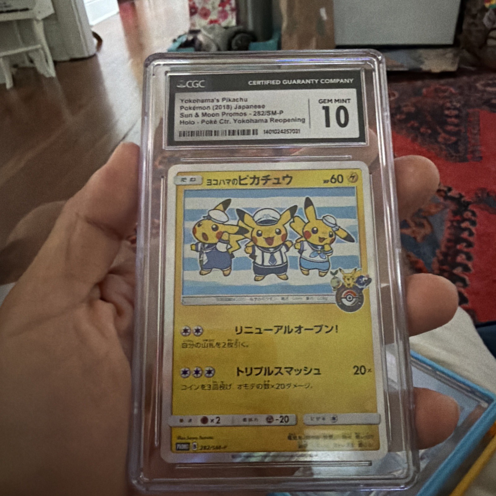 2018 Sun & Moon Promos - Japanese Yokohama's Pikachu Promo Poké Ctr. Yokohama Reopening (Holo) 282/SM-P