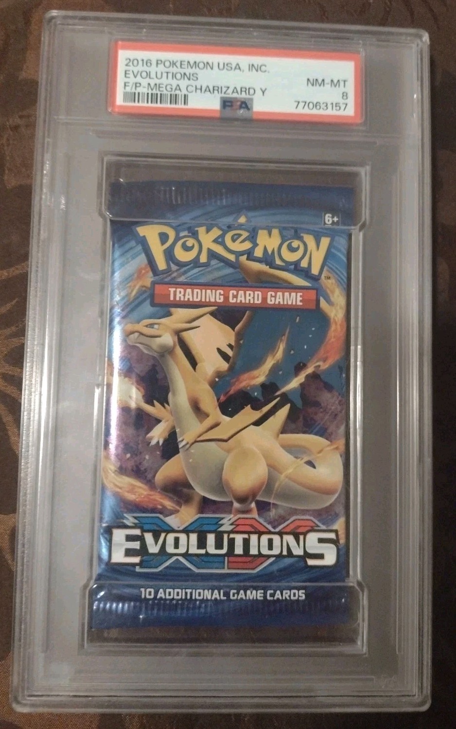 2016 Pokemon USA, Inc. Evolutions Foil Pack Foil Pack Mega Charizard Y